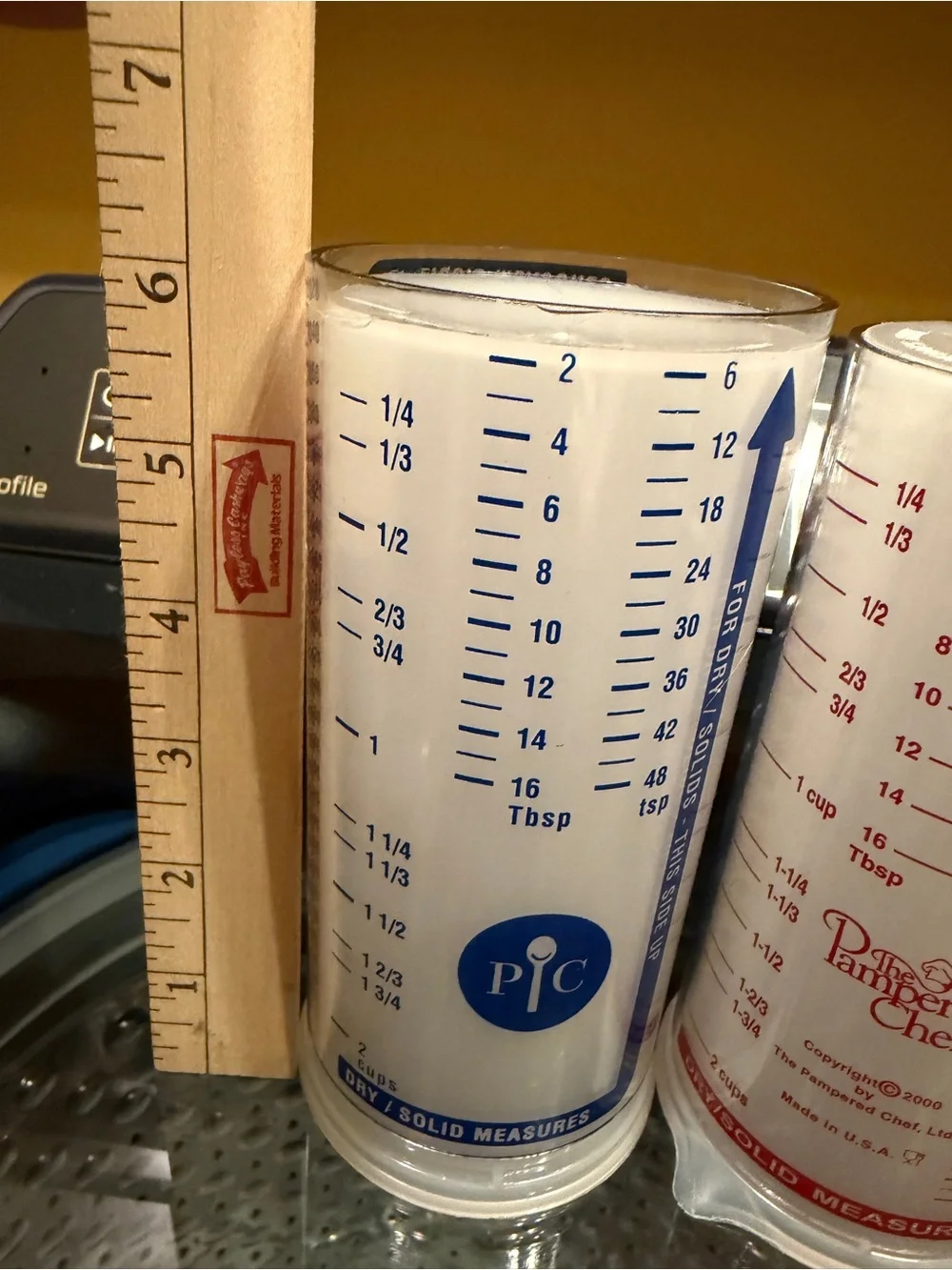 The Pampered Chef Measuring Cups with Red and Blue Markings